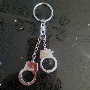 💚5/$25 Hand Cuff Silver Toned Keychain